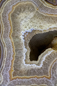 大理石测地线美丽的装饰石英晶体和裂缝斑点污渍的抽象图案自然背景等表面和质与石器晶体的矿物质料地图片