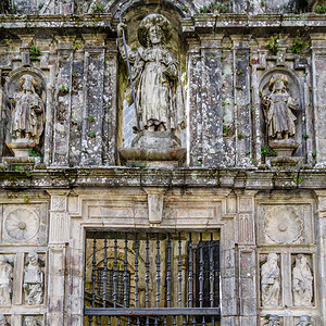 建筑细节西班牙圣地亚哥的孔波斯特拉大教堂外墙西班牙语正面雕塑图片