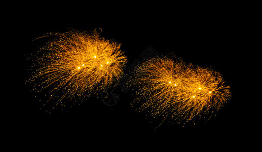 金色爆炸烟花展示以黑色背景隔绝天空丰富多彩的爆裂图片
