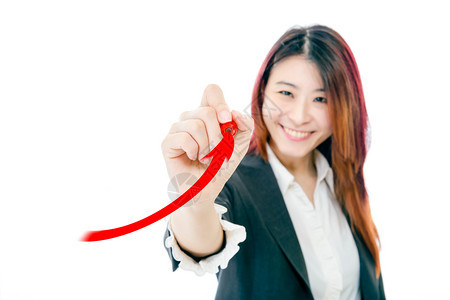 标记写作亚洲商业女人在虚拟屏幕金融概念上箭射肯尼图片