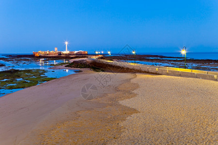 旅游西班牙卡迪兹省拉莱塔海滩的景观即将到卡迪斯州拉莱塔海滩黎明安达卢西亚建造图片