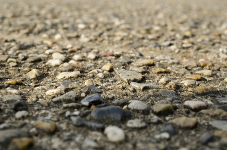 砾石街道宏观背景关于砾石路径或街道结构背景的详细宏观视图岩石人行道具体的图片