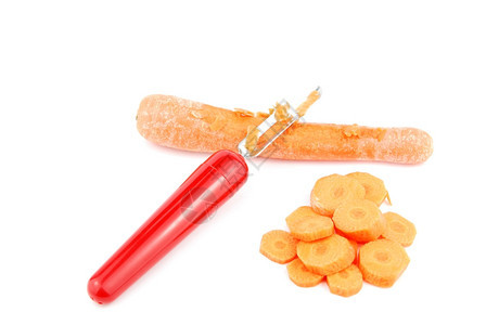 剥胡萝卜白背景上孤立的剥皮机用具素食主义者图片