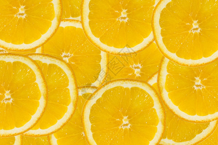酸的甜橙片柑橘水果的简要背景摘近身健康食品背景情况摄影室柠檬图片
