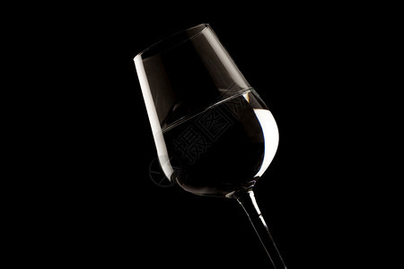 瓶子庆典黑色背景突出显示的葡萄酒玻璃边照的片图片