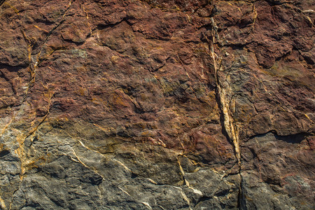 有质感的垃圾摇滚自然岩石或表面作为背景纹理石灰背景图片