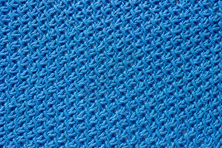 编织有缝线的手工造织物与蓝色纱布捆绑在一起有图案的蓝色空气图片