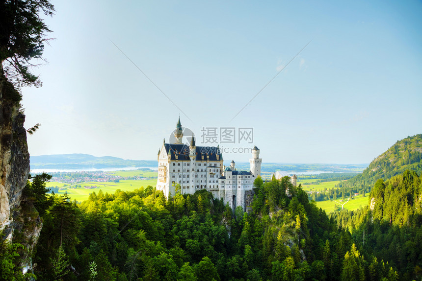 菲森风景一种德国巴伐利亚的纽什旺斯坦城堡阳光明媚的日子图片