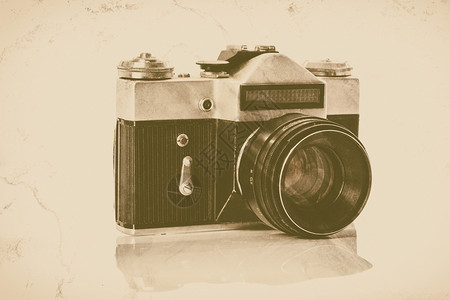 镜片优质的在白色背景古老效应下被孤立的专业反光镜像SLR相机的档案视图古董图片