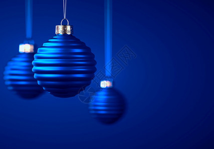 罗纹大气层绞刑三个皇家蓝色横直的圣诞圆形球挂在绳索上蓝背景的圣诞节装饰庆气氛概念选择焦点复制空间选择焦点复制空间背景图片