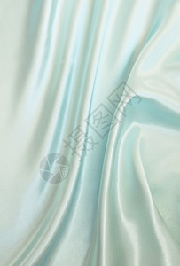装饰平滑优雅蓝色丝绸可用作背景缎面精美的图片