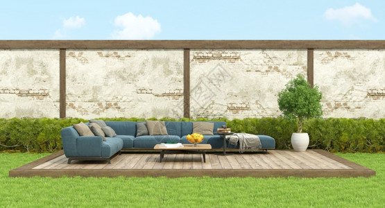 一种叶子在甲板地上的一个花园中现代蓝色沙发和背景的旧墙壁3D在甲板地上的花园中制造现代蓝色沙发咖啡图片