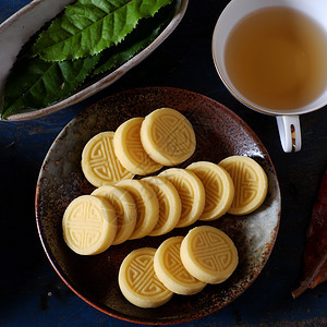 杯子颜色越南甜食来自绿扁豆的青蛋糕传统茶叶时间食物餐盘木本底茶杯等传统的图片