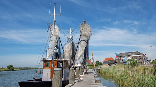 绳索运输拖网渔船荷兰Wor工人港旧式传统捕鱼船荷兰港口图片