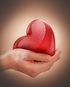 捐款握着3D红心的手医疗概念形象浪漫设计献金日帮助的概念象征卫生保健图片