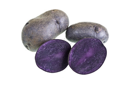 马铃薯是一种新的土豆品在皮肤和肉身中呈现深紫色红番薯极乐自然颜色图片