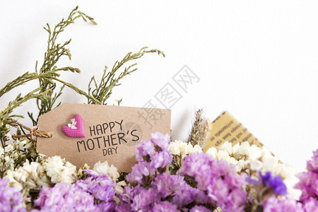 粉色的晒干复制空间带母亲每日卡片的干鲜花包图片