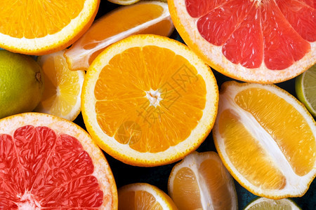 切片柑橘水果收集食物背景橙子柠檬石灰和葡萄果新鲜水本底各种样的素食主义者图片