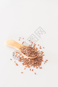 清洁厨房餐桌上的棕色麻布种子谷物草本植自然图片