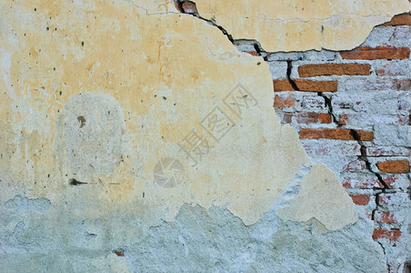 古董风化水泥碎砖墙背景图片