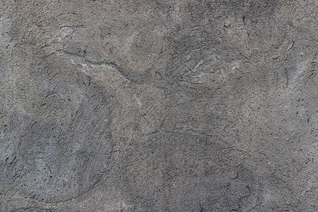 有质感的碎石以沙土和水泥为根据的混凝土表面质状具有裂纹摘要背景无缝纹理地面图片