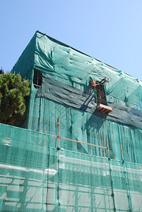 建成外部的地点正在建造住宅筑蓝色天空背景图片