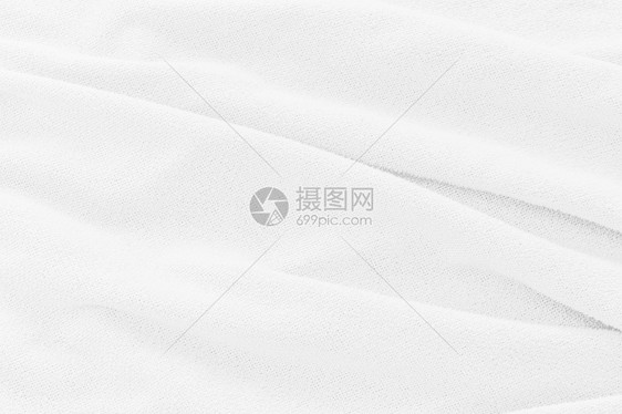 亚麻布料柔软的白色织物纹理背景用于墙纸或背景的具有软波抽象布时尚图片