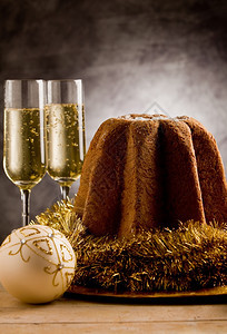 庆祝闪发光的照片意大利美味的圣誕蛋糕加香槟杯酒甜的图片