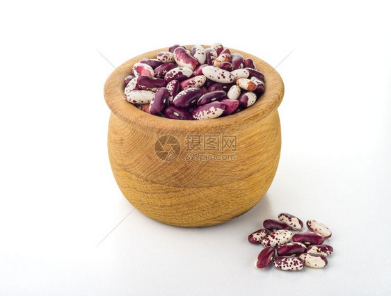 一个木碗中的红甘奈利尼豆生色的瓜拉纳皮图片