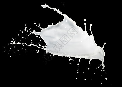 画黑色背景孤立的牛奶喷洒明亮流动图片