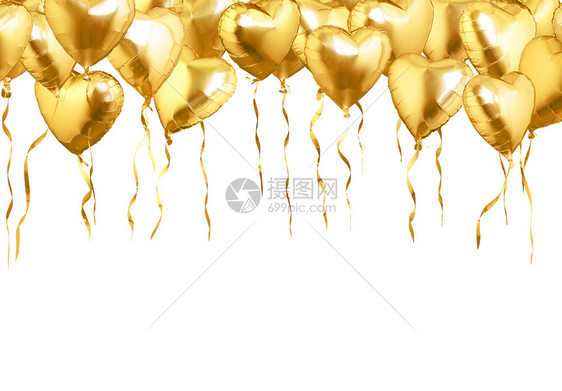 金心形空气球飞动孤立于白底的色庆典金成形图片