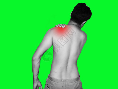 一个男人肩部疼痛绿色背景人们年轻的受伤图片