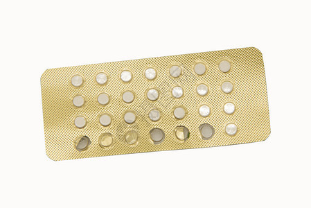 女士白色背景中分离的避孕药具有剪切路径避孕药保健和物片康图片