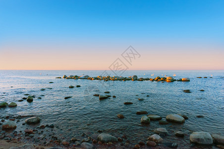 场景海浪天空上日落岸出上落图片