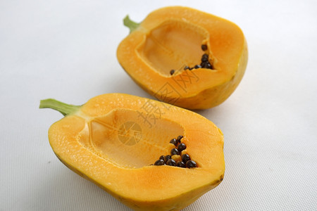 食物白色背景的木瓜热带水果越南农产品丰富的纤维和生素ACE使心脏健康预防神乐硬化症消系统有益通营养制作卡利图片