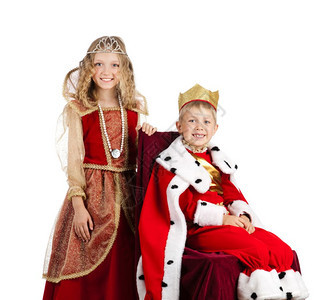 快乐的小男孩女肖像在国王和奎恩嘉年华服装欢迎白色的美丽图片
