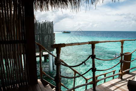 一种假期从马尔代夫的一座水别墅取出海洋的一面大溪地背景图片