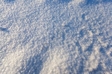 气候冬季雪下漂的表面和结构细节太阳雪结构照亮了积在冬天因太阳结构而明亮经过冷若冰霜图片