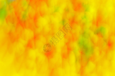 明亮的艺术弄脏黄色橙和绿颜中的幻影形态背景斑点和污迹摘要背景黄橙色和绿颜背景带有领染色效应和连状果图片