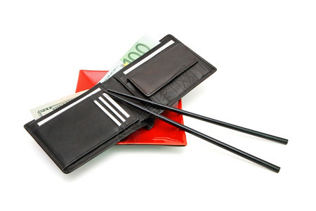 欧元美黑钱包有在红方盘上用筷子隔离东图片