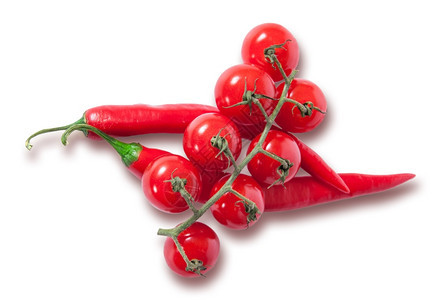 钟颜色自然白背景中分离的樱桃番茄和两个红辣椒的枝条图片