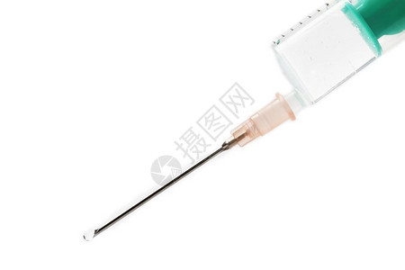 疫苗接种斯塔克一个针筒在白色的一根针筒上水滴在白色背景注射器图片