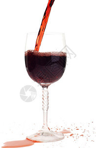 酒鬼圆形的味道红葡萄酒倒入白底的晶玻璃杯中图片