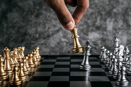 金子力量为商业规划和比喻选择重点比较而象棋打人手有选择的焦点打败图片