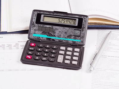 财务报表的计算格上器和财务文件表格上的计算器和财务文件档帐户圆珠笔图片