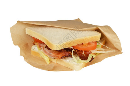 熏肉纸含生菜的三明治培根和白底番茄BLT一顿饭图片