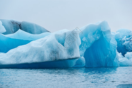 旅游冰岛瓦特纳川附近的Jokulsarlonrsquos湖中的冰山岛湖中的山美丽北极图片