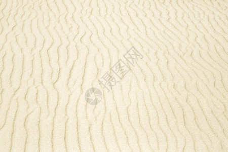 沙子作为风的Wavy模式背景纹理海滨制作晴天图片