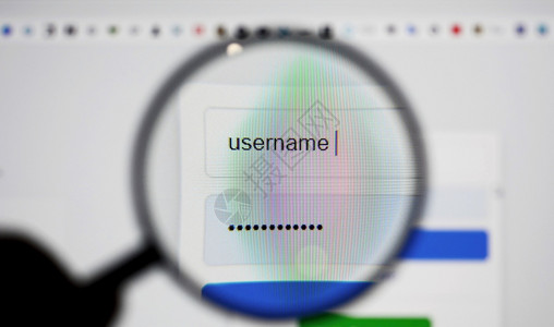 登录页面背景图以用户名和密码框在互联网浏览器中查看登录页面屏幕上的放大镜V处理玻璃私人的背景