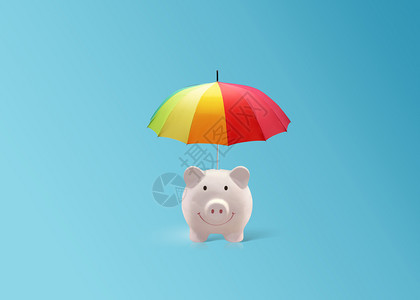 粉色的红小猪陶瓷银行配有彩虹伞和安全保险相信节省图片